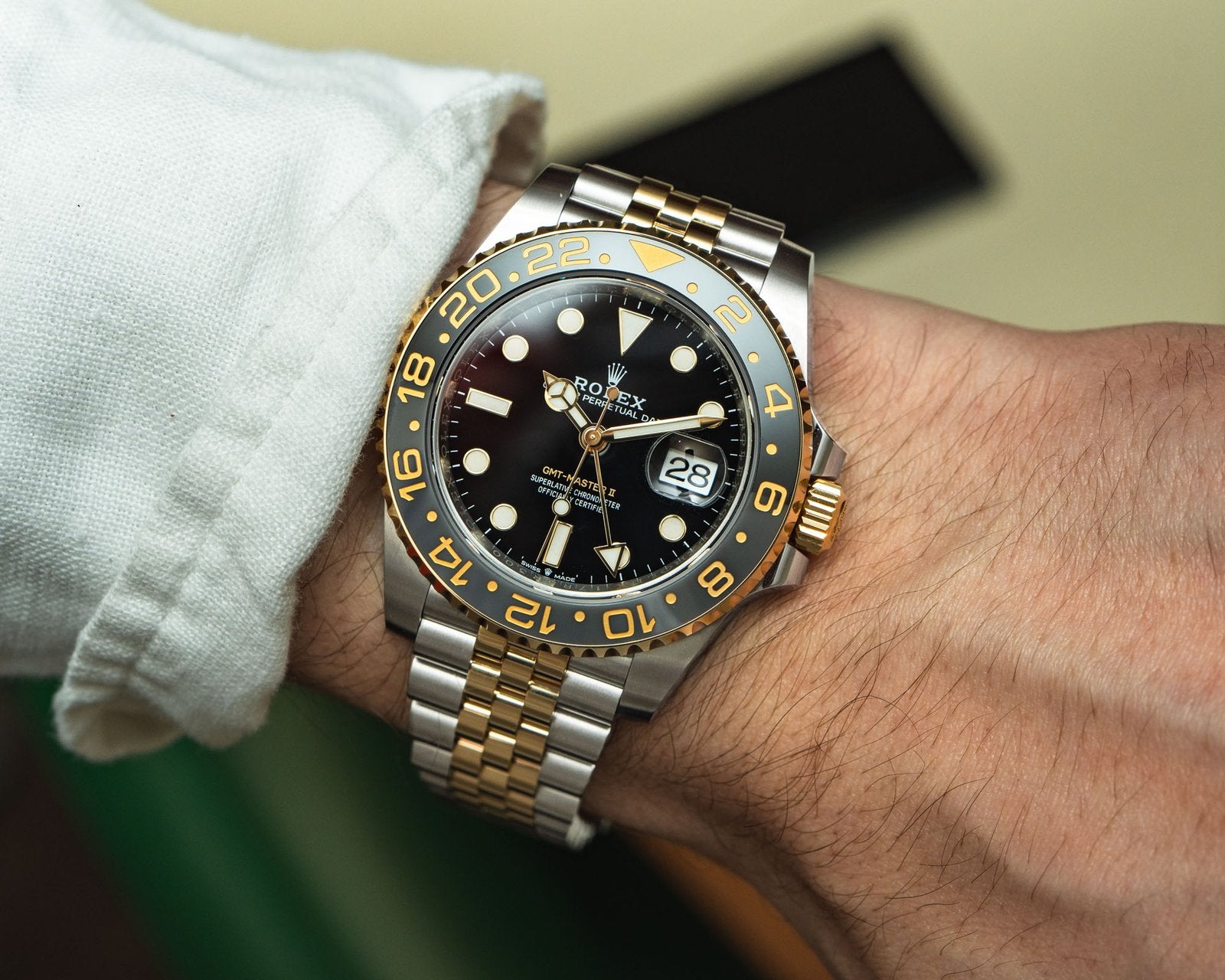 GMT-Master II yellow gold with a black dial and a Jubilee bracelet.
