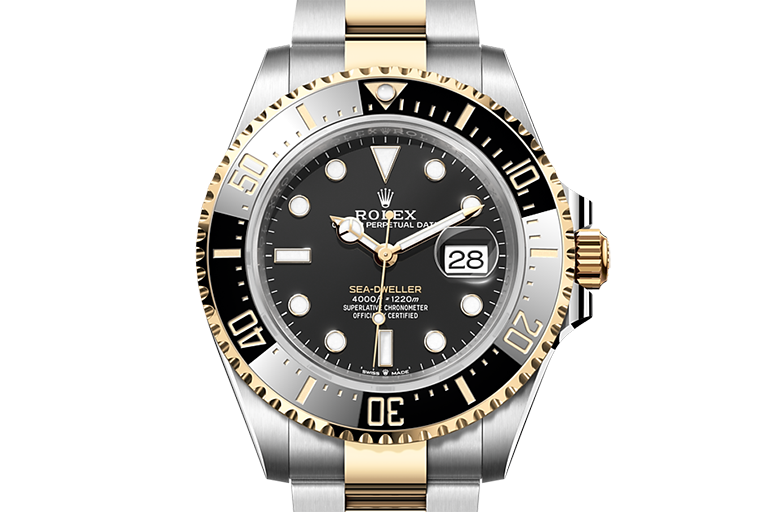 Rolex Sea-Dweller yellow gold Bezel and black dial