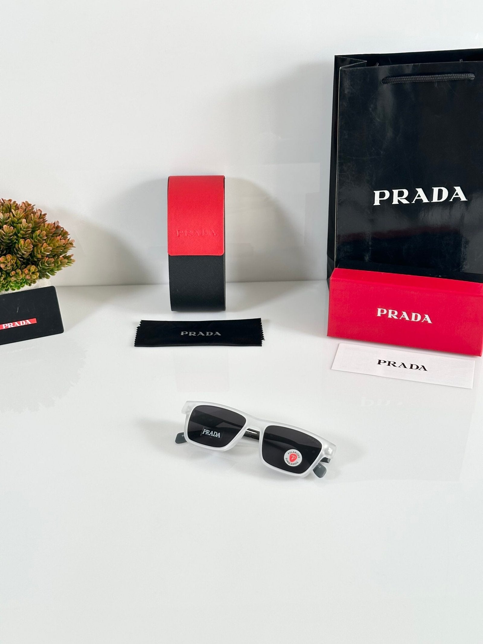 Prada_144_Ice_Black_Grey_Stick