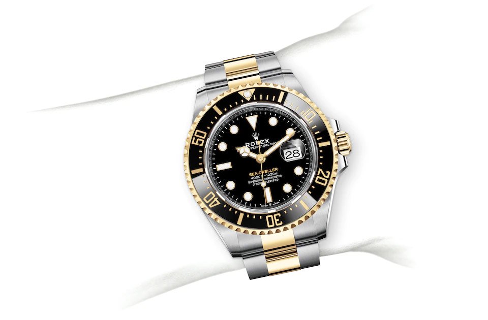Rolex Sea-Dweller yellow gold Bezel and black dial