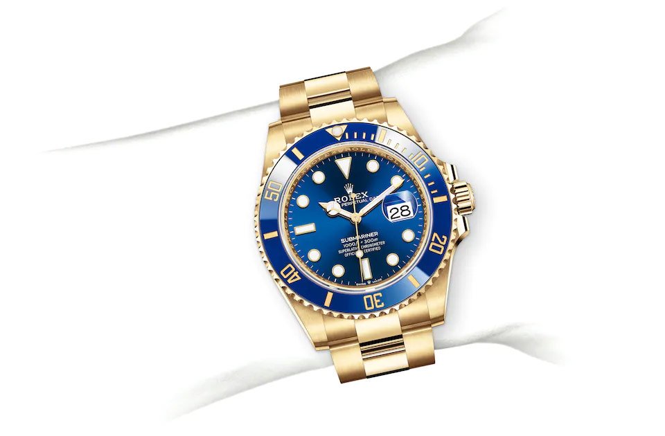 Rolex Submarine yellow gold and a blue dial date