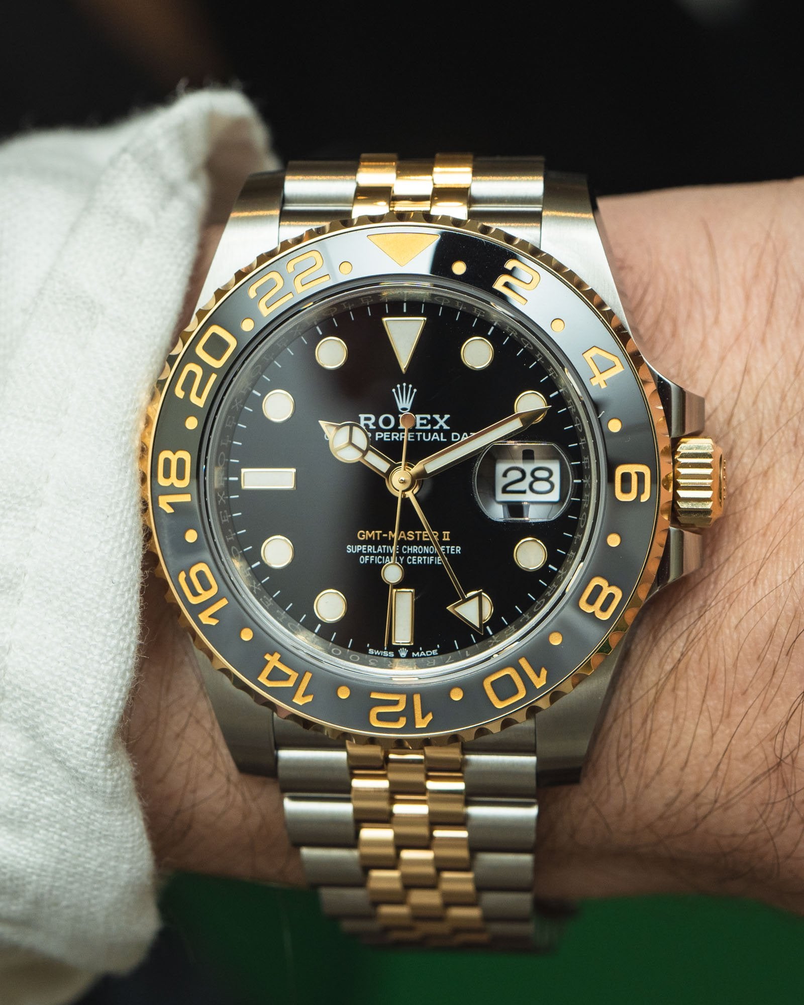 GMT-Master II yellow gold with a black dial and a Jubilee bracelet.