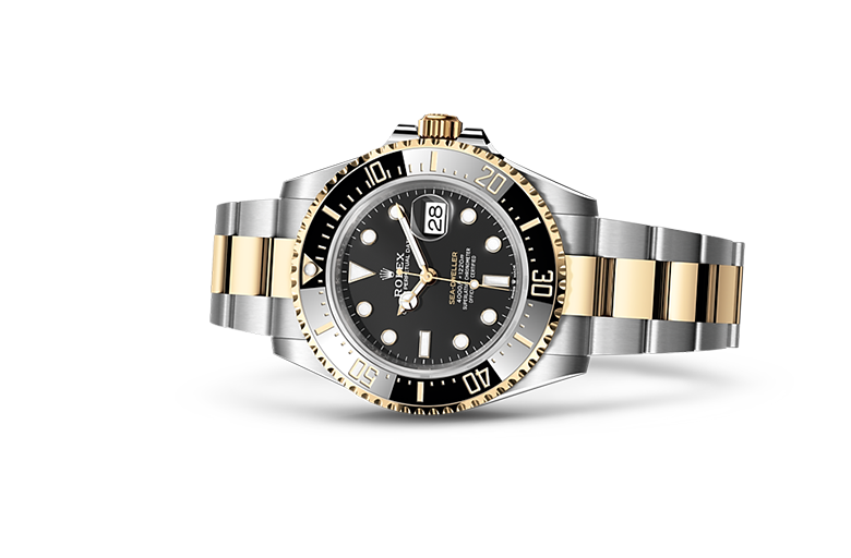 Rolex Sea-Dweller yellow gold Bezel and black dial