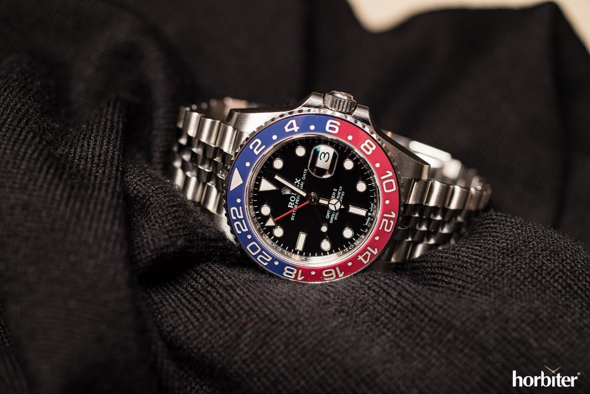 GMT-Master II red and blue Cerachrom bezel black dial and a Jubilee bracelet.